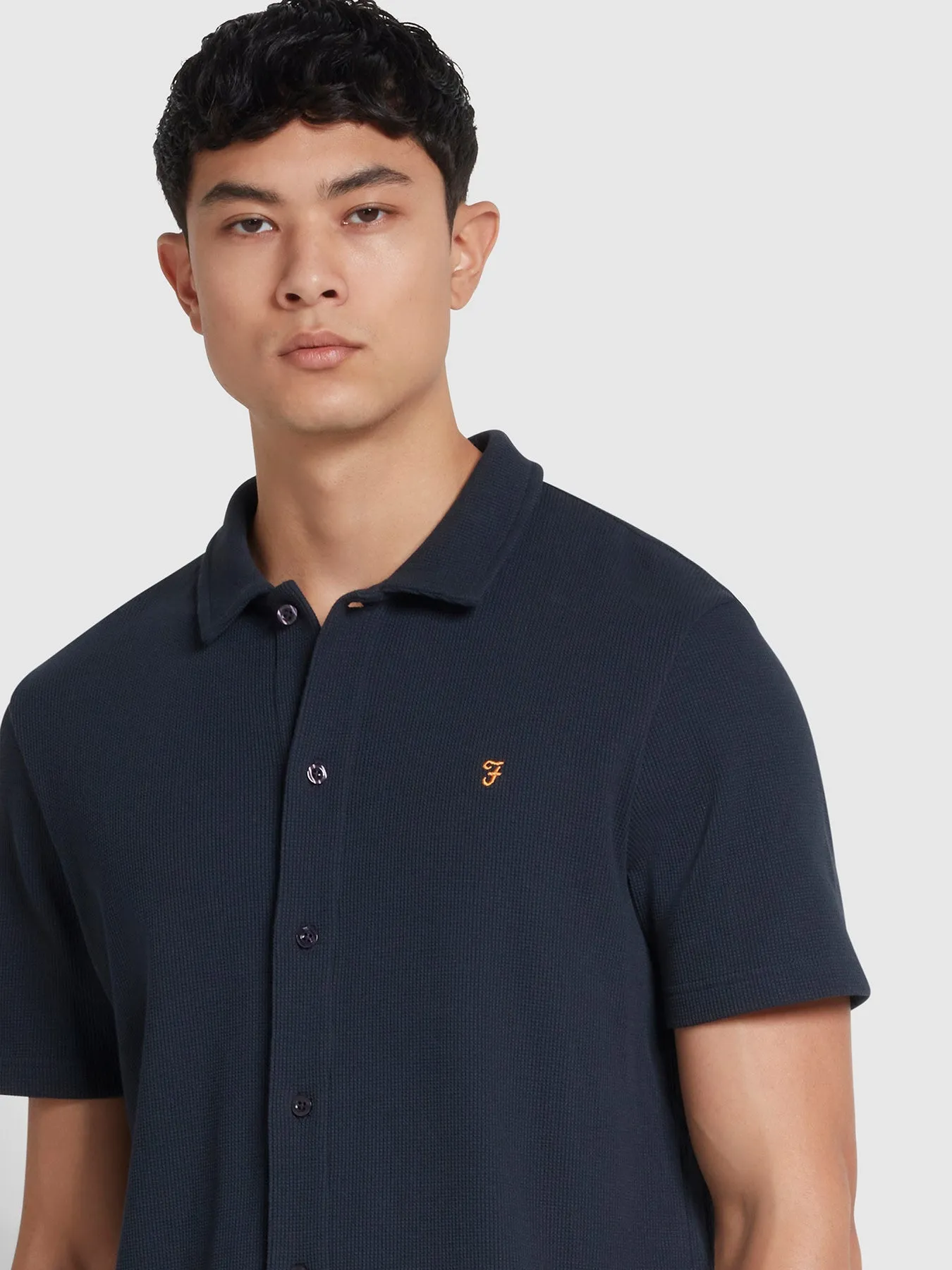 Denny Button-Through Waffle Polo Shirt In True Navy