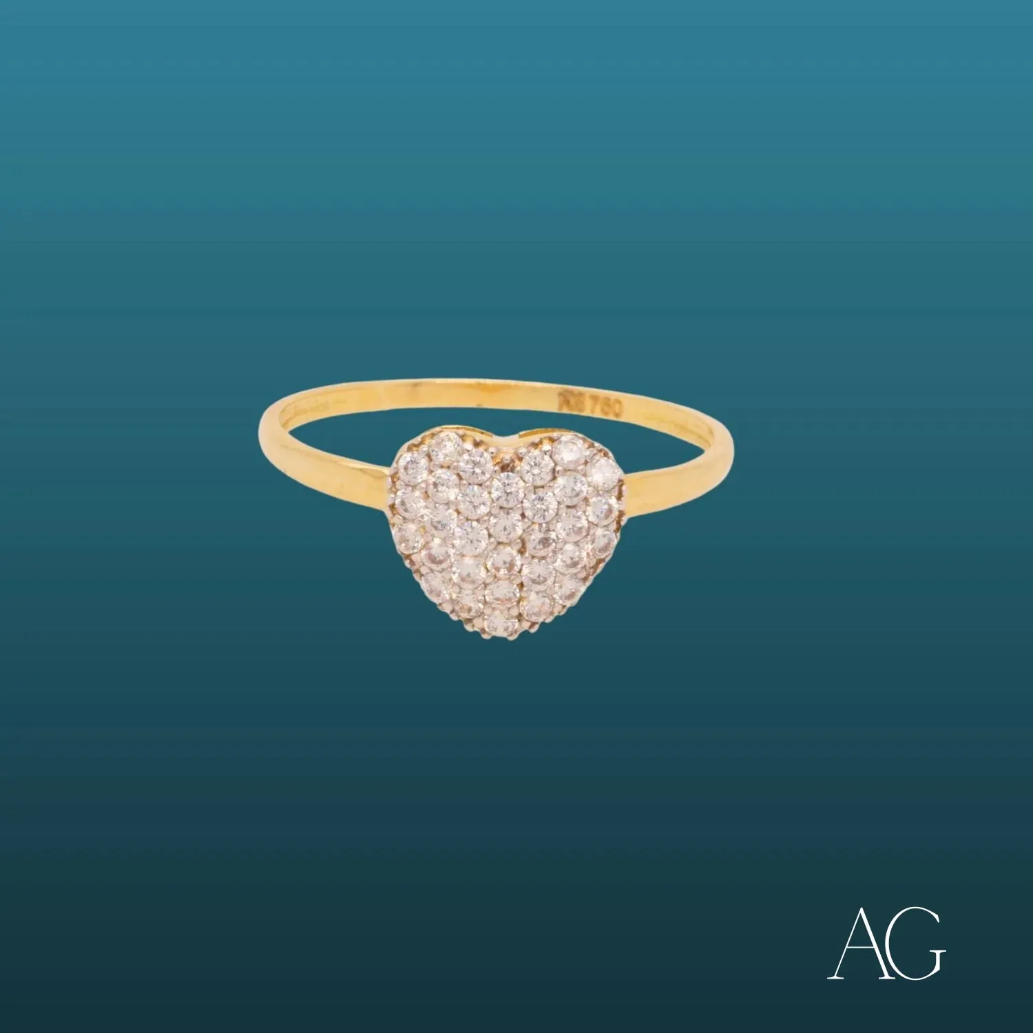 Discover Love's True Brilliance: The 18k Heart Adorned with CZ Ring