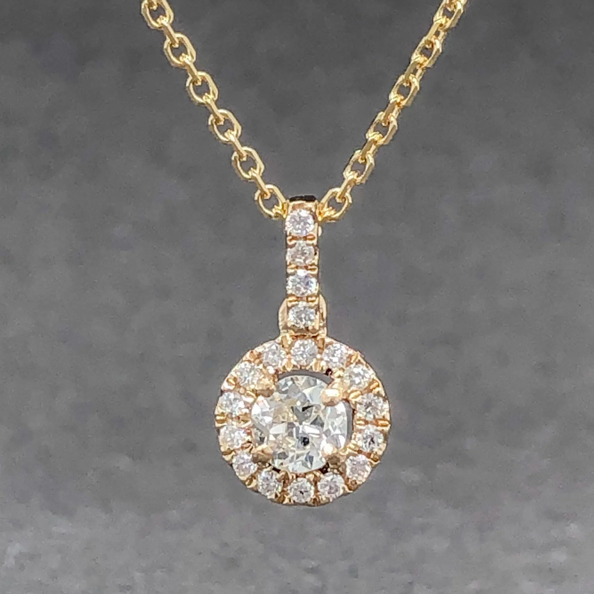 Estate 14K Y Gold 0.25cttw G-I/VS2-SI1 Diamond Halo Pendant