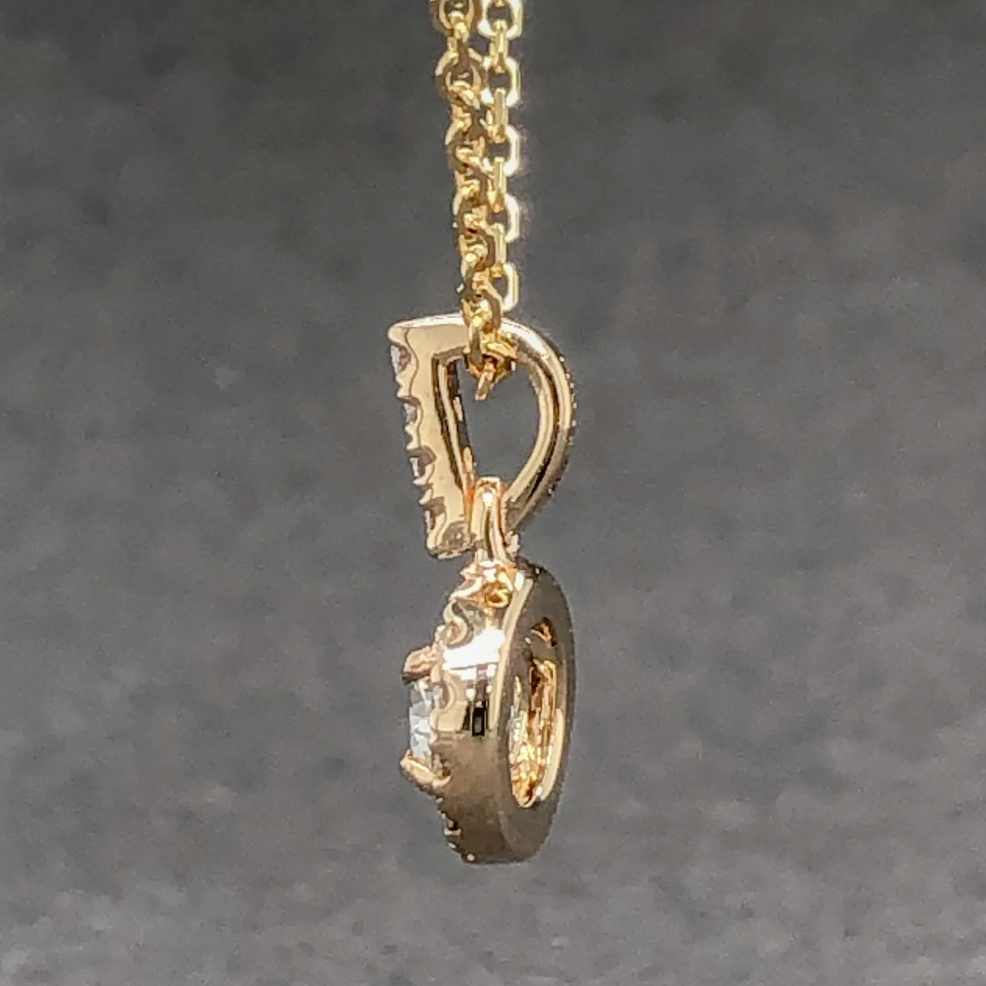 Estate 14K Y Gold 0.25cttw G-I/VS2-SI1 Diamond Halo Pendant