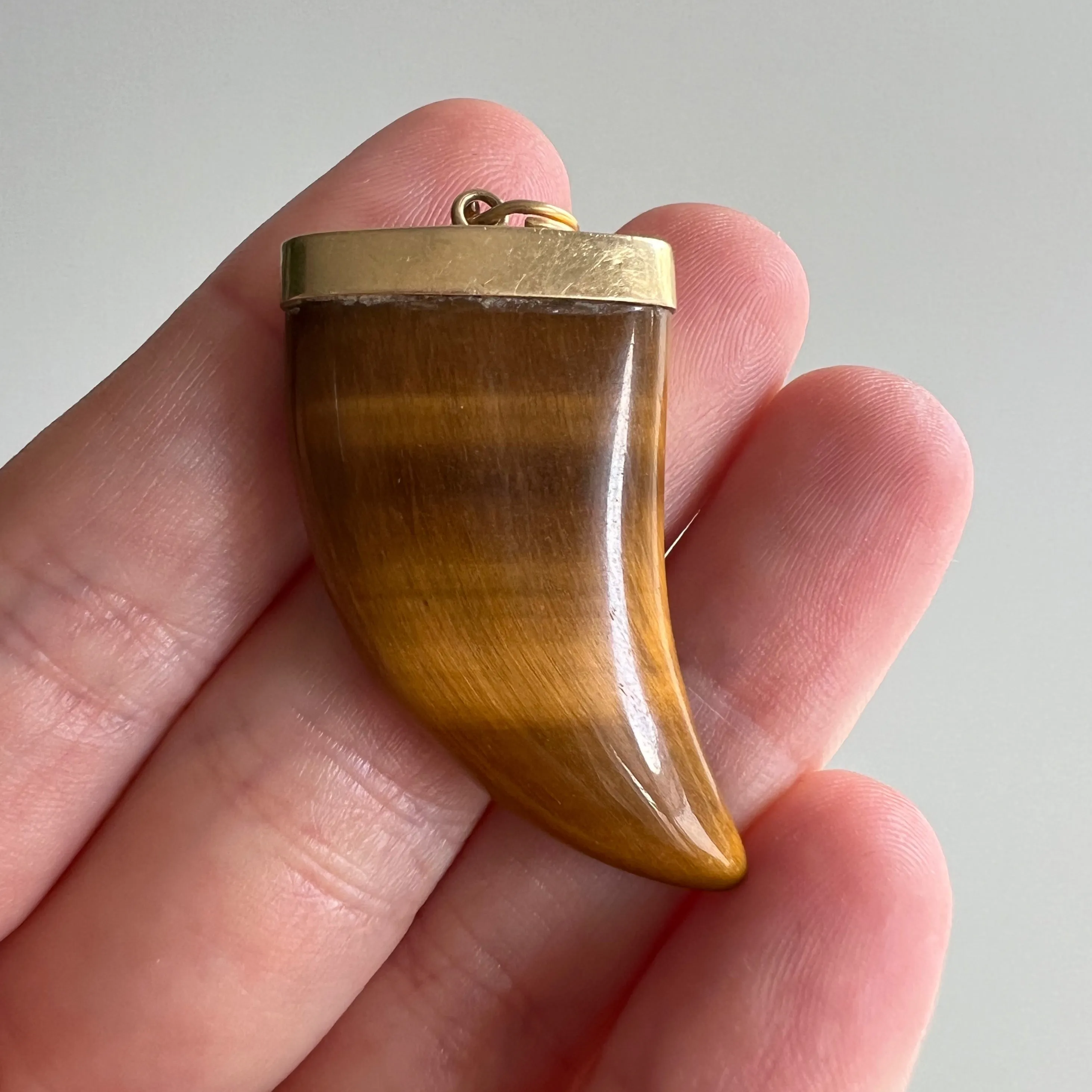 V I N T A G E // like a tusk / 14k and tigers eye mid century tusk / a pendant