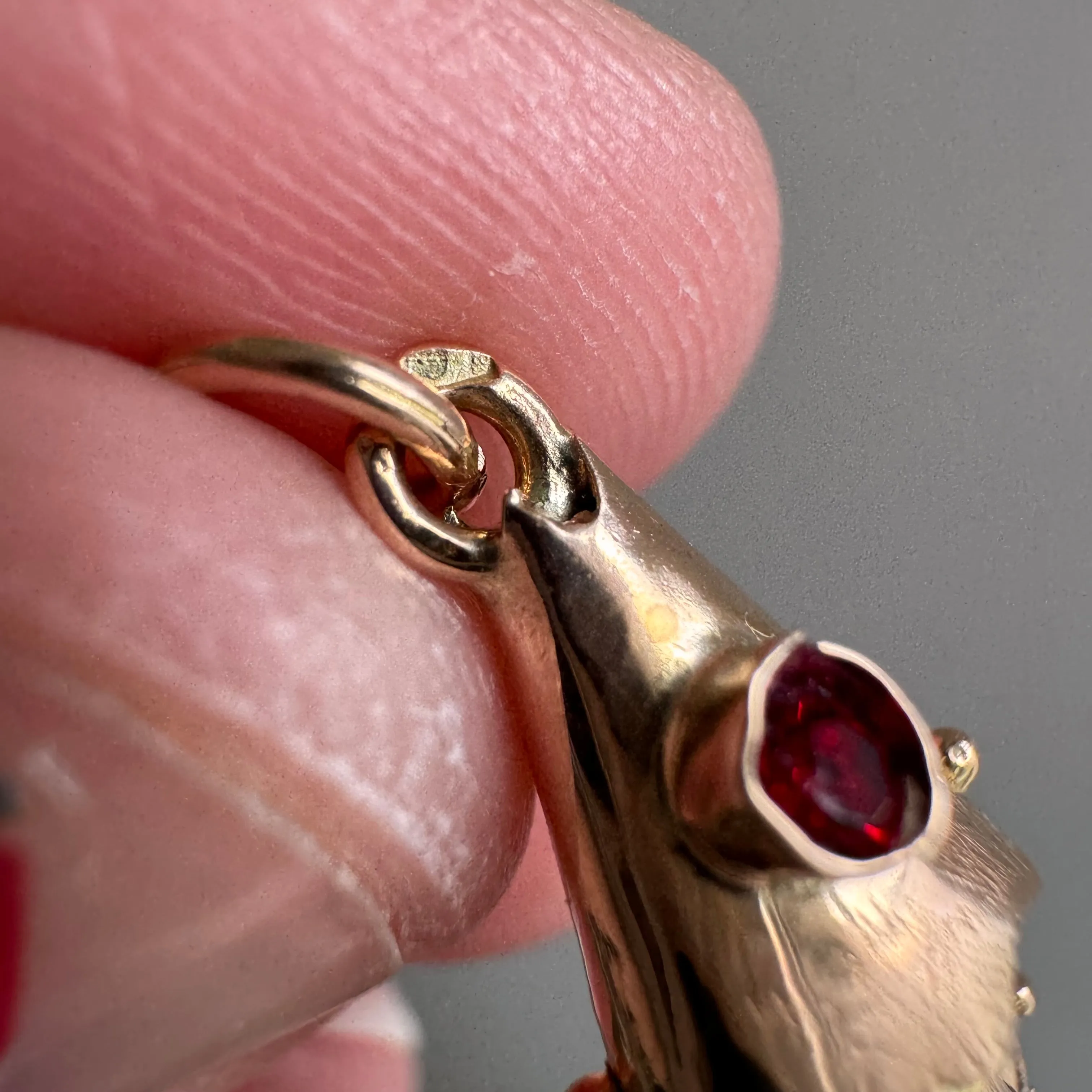 V I N T A G E // wiggly catch / 14k rosy yellow gold and red glass articulated wiggle fish / a pendant