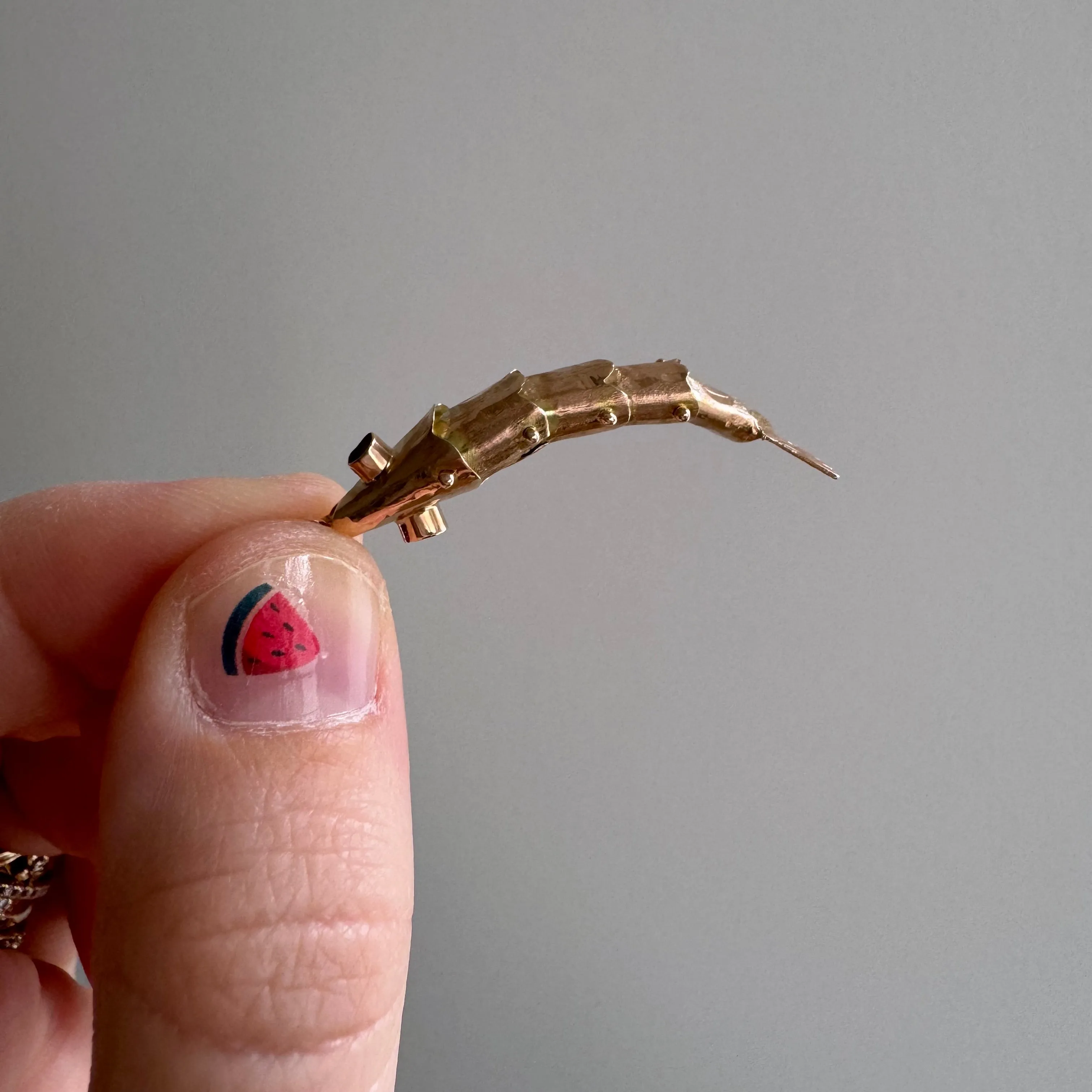 V I N T A G E // wiggly catch / 14k rosy yellow gold and red glass articulated wiggle fish / a pendant