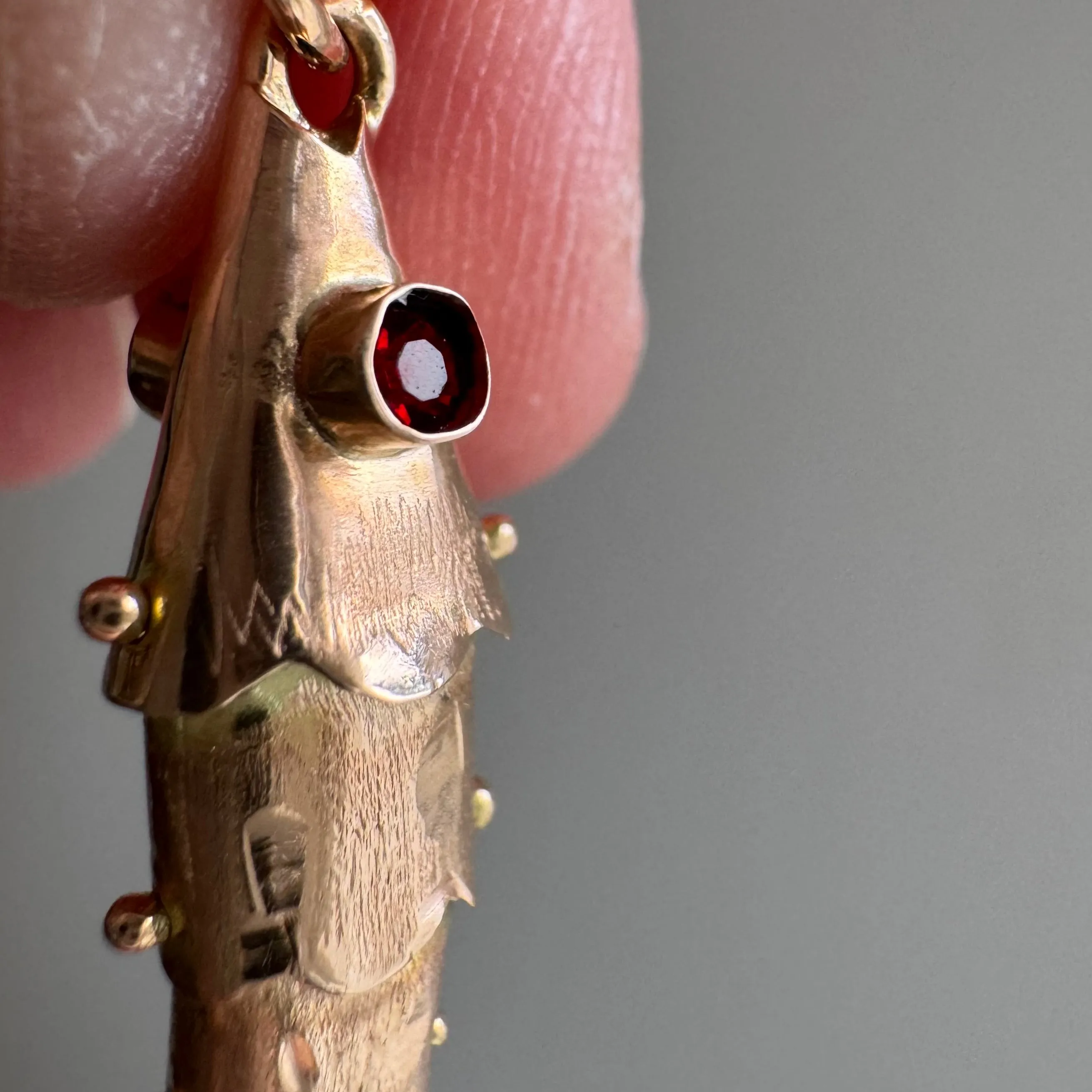 V I N T A G E // wiggly catch / 14k rosy yellow gold and red glass articulated wiggle fish / a pendant