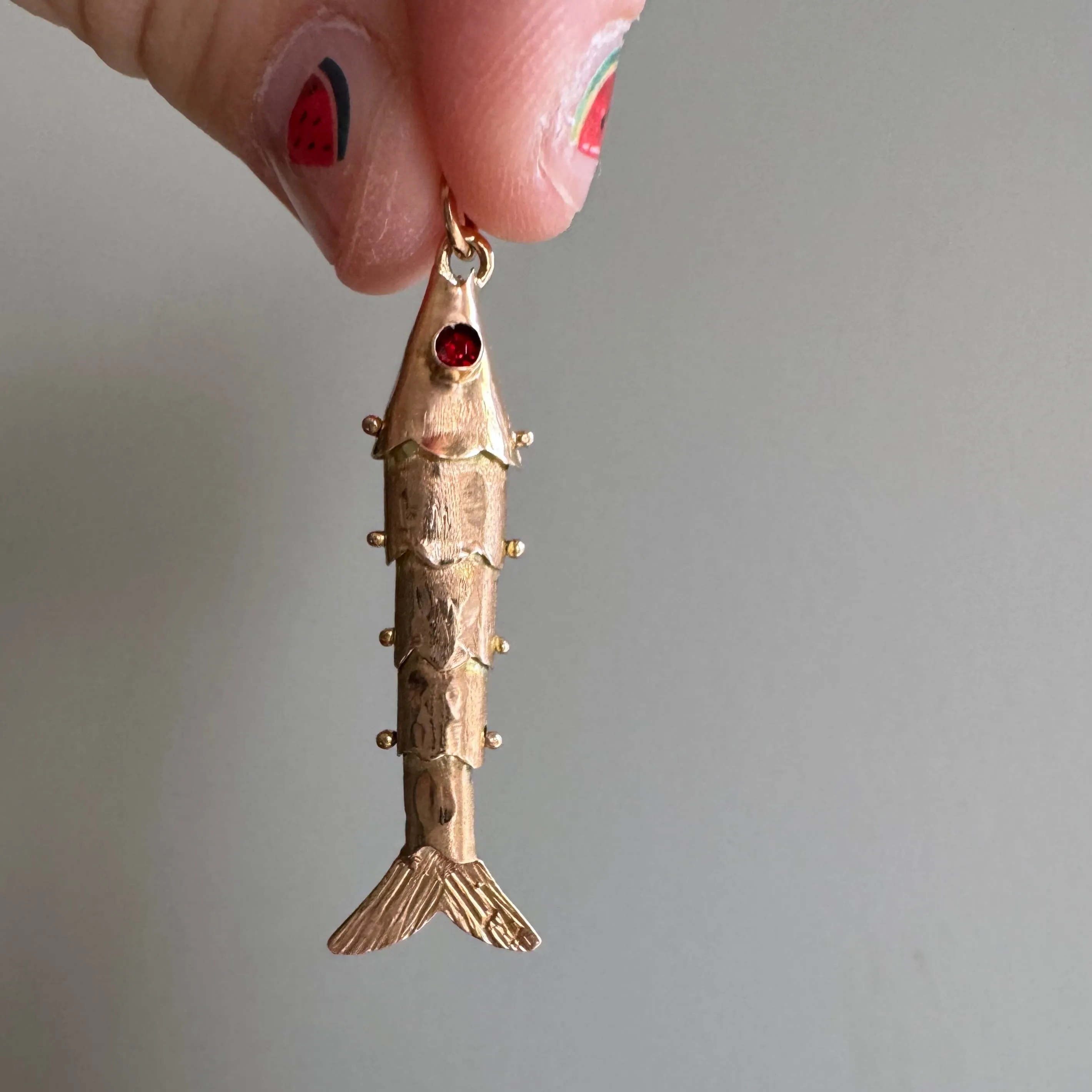 V I N T A G E // wiggly catch / 14k rosy yellow gold and red glass articulated wiggle fish / a pendant