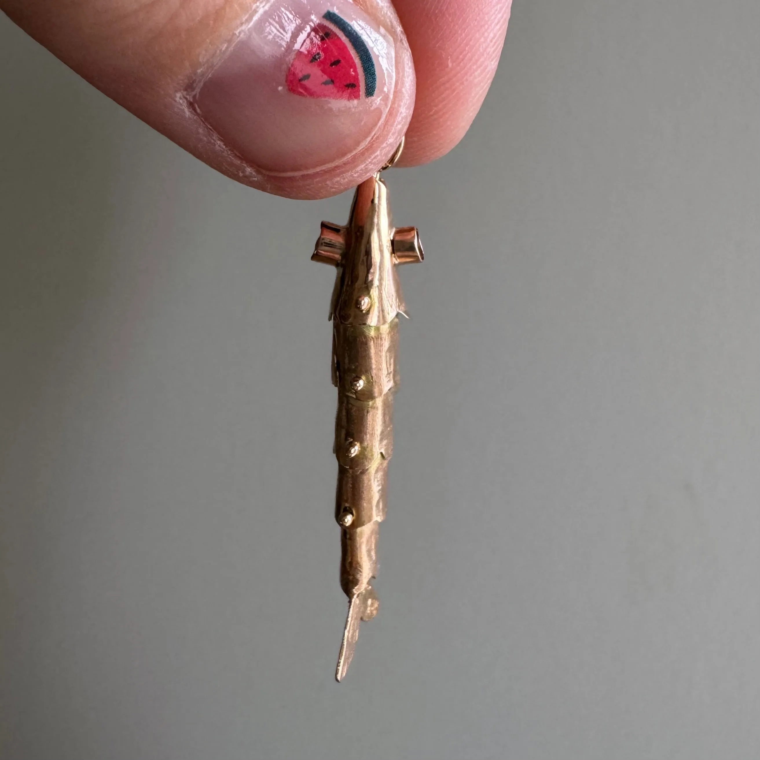 V I N T A G E // wiggly catch / 14k rosy yellow gold and red glass articulated wiggle fish / a pendant